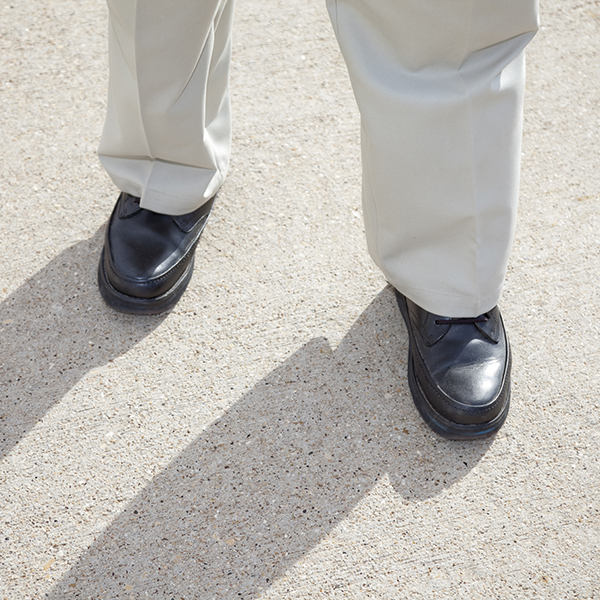 feet in black shoes