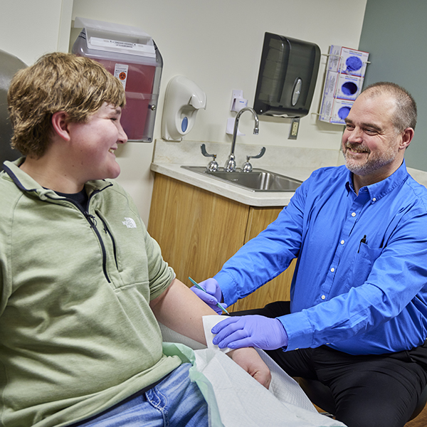 Dr. Petersen and wound patient