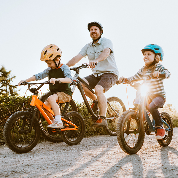 Family riding bike together