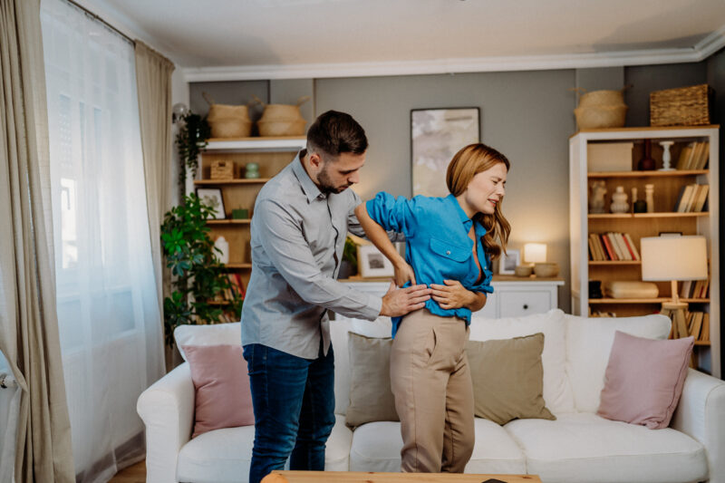 woman experiencing back pain