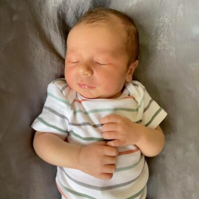 baby wearing striped onesie