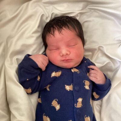 baby wearing monkey onesie