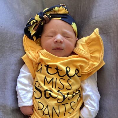 baby wearing yellow little miss sassy pants outfit